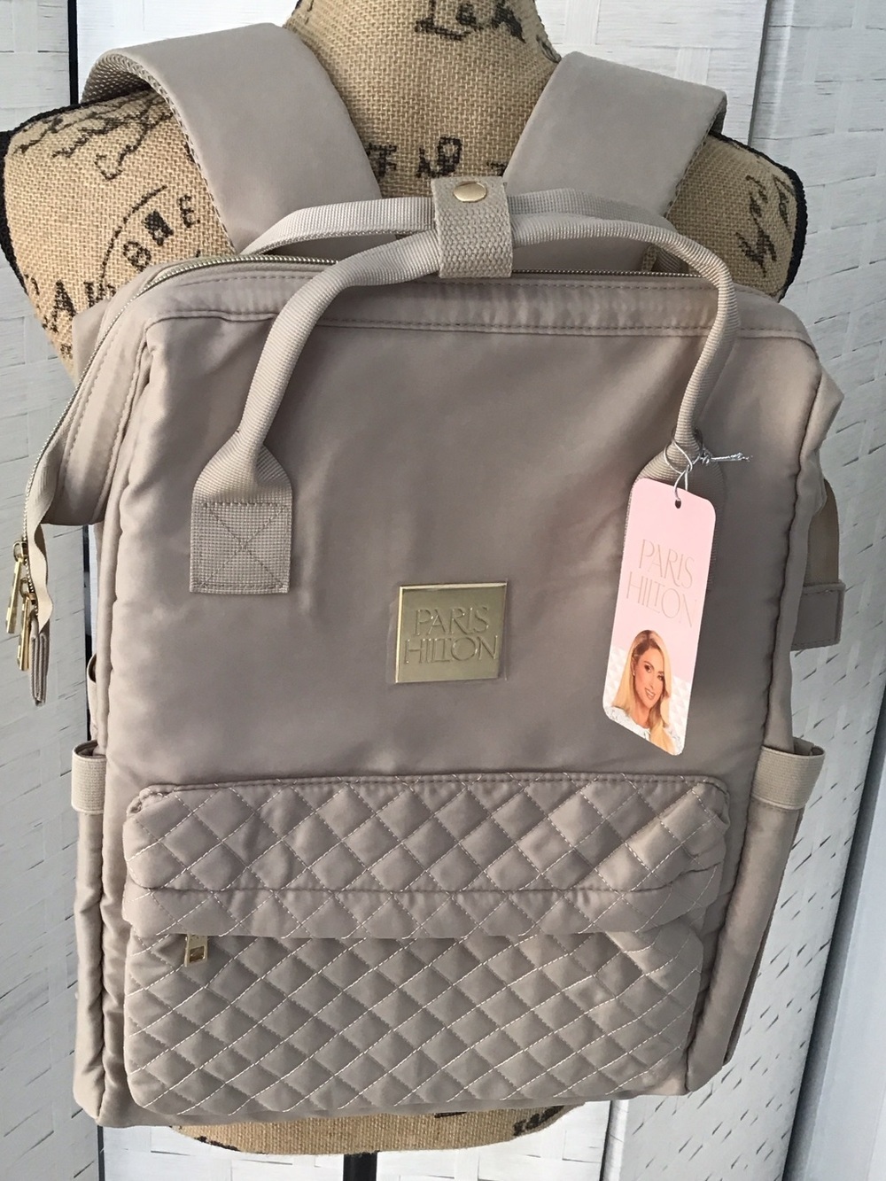 Paris Hilton Beige Quilted Backpack Tote with Gold logo. ##